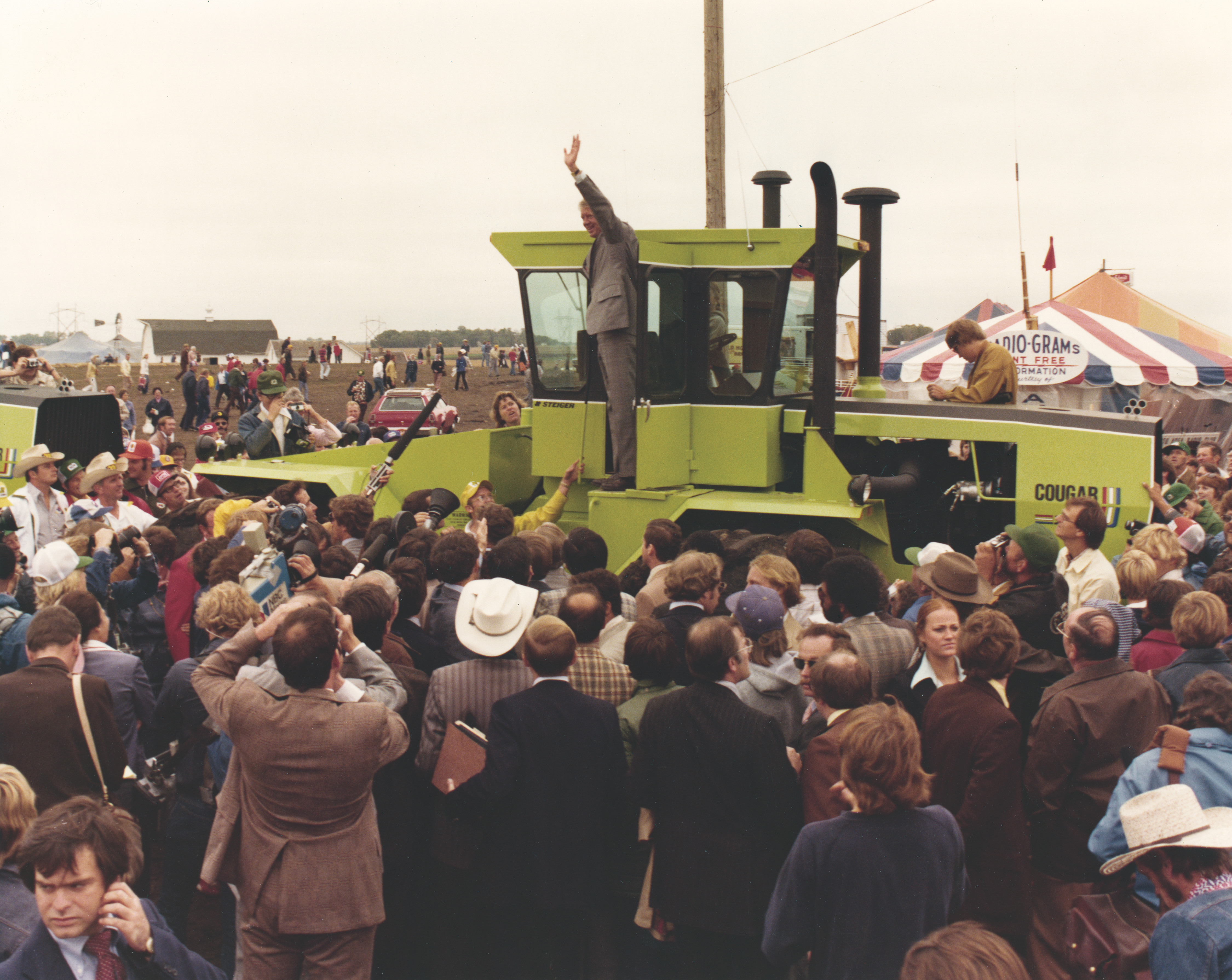 crowd around steiger tractor